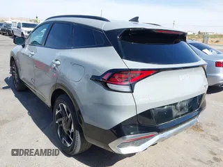 2024 Kia Sportage SX-Prestige with VIN 5XYK5CDF1RG143931, listed as a IAAI auction lot 42236962 with 23,461 mi miles and . Bid and sale history available at DreamBid. Image 3.