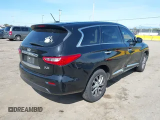 2013 Infiniti JX35 with VIN 5N1AL0MN5DC324112, listed as a IAAI auction lot 41794165 with 129,324 mi miles. Bid and sale history available at carsss.com. Image 4.