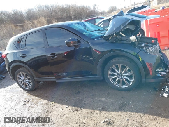 2021 Mazda CX-5 Grand Touring with VIN JM3KFBDM0M1357587, listed as a IAAI auction lot 41680245 with 1 mi miles. Bid and sale history available at carsss.com. Image 13.