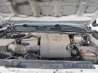 2020 Toyota Tacoma SR5 z VIN 5TFCZ5AN5LX242708, wystawiony jako IAAI lot #42356772 z przebiegiem 65 442 mil mil oraz . Historia ofert i sprzedaży dostępna na DreamBid. Obrazek 10.