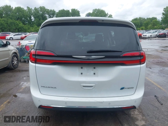 2023 Chrysler Pacifica Hybrid Touring L z VIN 2C4RC1L78PR608880, wystawiony jako IAAI lot #42382470 z przebiegiem 64 278 mil mil oraz . Historia ofert i sprzedaży dostępna na DreamBid. Obrazek 16.