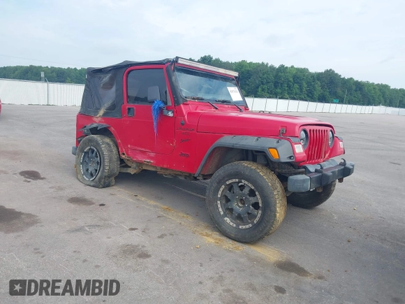 2001 Jeep Wrangler Sport z VIN 1J4FA49S31P335680, wystawiony jako IAAI lot #42471312 z przebiegiem 212 927 mil mil oraz . Historia ofert i sprzedaży dostępna na DreamBid. Obrazek 1.