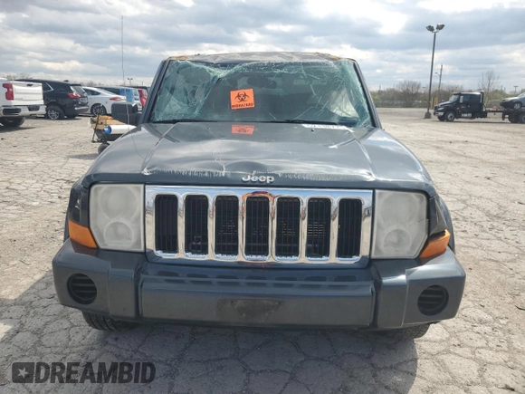2007 Jeep Commander Sport z VIN 1J8HG48K47C691109, wystawiony jako Copart lot #52138775 z przebiegiem 231 327 mil mil oraz Szkoda całkowita • Salvage title. Historia ofert i sprzedaży dostępna na DreamBid. Obrazek 5.