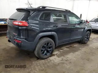 2015 Jeep Cherokee Trailhawk z VIN 1C4PJMBS0FW598694, wystawiony jako Copart lot #60731615 z przebiegiem 130 219 mil mil oraz Czysty tytuł • Clean title. Historia ofert i sprzedaży dostępna na DreamBid. Obrazek 3.