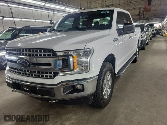 2018 Ford F-150 XL with VIN 1FTEW1E59JKD11351, listed as a IAAI auction lot 42663848 with 128,761 mi miles and . Bid and sale history available at DreamBid. Image 34.