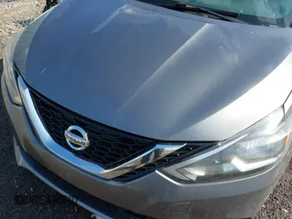 2018 Nissan Sentra S with VIN 3N1AB7AP3JY218818, listed as a IAAI auction lot 41929535 with 200,156 mi miles and . Bid and sale history available at DreamBid. Image 10.