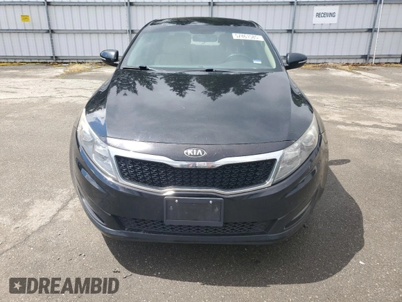 2013 Kia Optima LX z VIN 5XXGM4A79DG144608, wystawiony jako Copart lot #57461585 z przebiegiem 120 677 mil mil oraz Szkoda całkowita • Salvage title. Historia ofert i sprzedaży dostępna na DreamBid. Obrazek 5.
