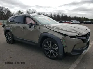 2025 Mazda CX-50 Premium z VIN 7MMVABDY4SN312522, wystawiony jako Copart lot #49078495 z przebiegiem 963 mil mil oraz Szkody całkowita. Historia ofert i sprzedaży dostępna na DreamBid. Obrazek 4.