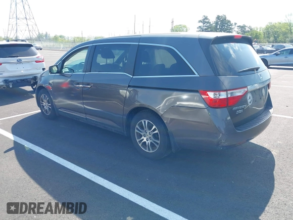 2011 Honda Odyssey EX-L with VIN 5FNRL5H62BB058765, listed as a IAAI auction lot 42017802 with 178,512 mi miles and . Bid and sale history available at carsss.com. Image 3.