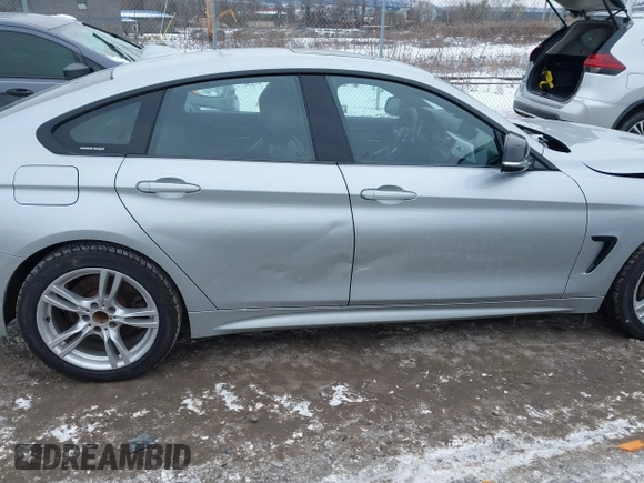 2016 BMW 4 Series 428i xDrive with VIN WBA4C9C53GG136870, listed as a IAAI auction lot 41410071 with 116,187 mi miles and . Bid and sale history available at DreamBid. Image 17.