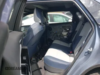 2023 Subaru Solterra Limited z VIN JTMABABA9PA035506, wystawiony jako IAAI lot #41926175 z przebiegiem 11 848 mil mil oraz . Historia ofert i sprzedaży dostępna na DreamBid. Obrazek 8.