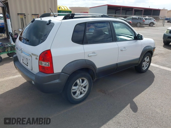 2006 Hyundai Tucson GLS with VIN KM8JN12D06U368350, listed as a IAAI auction lot 41645473 with 127,217 mi miles. Bid and sale history available at carsss.com. Image 4.