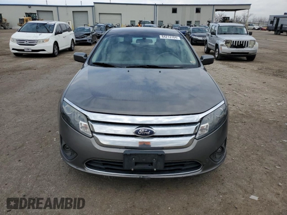 2012 Ford Fusion SE with VIN 3FAHP0HAXCR304720, listed as a Copart auction lot 84213164 with 130,215 mi miles and Salvage Title. Bid and sale history available at carsss.com. Image 5.