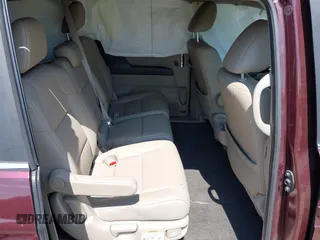 2014 Honda Odyssey EX-L z VIN 5FNRL5H64EB076088, wystawiony jako IAAI lot #42144781 z przebiegiem 174 135 mil mil oraz . Historia ofert i sprzedaży dostępna na DreamBid. Obrazek 8.