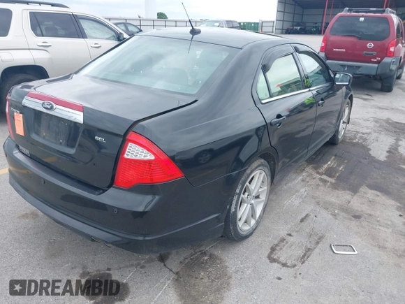 2012 Ford Fusion SEL z VIN 3FAHP0JA6CR363421, wystawiony jako IAAI lot #42552226 z przebiegiem 132 627 mil mil oraz . Historia ofert i sprzedaży dostępna na DreamBid. Obrazek 4.
