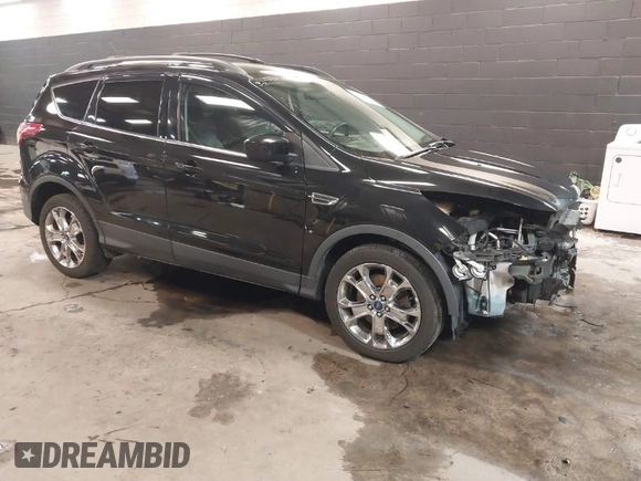 2014 Ford Escape SE with VIN 1FMCU9GX7EUA80983, listed as a IAAI auction lot 41504942 with 133,952 mi miles. Bid and sale history available at carsss.com. Image 1.
