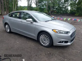2013 Ford Fusion SE Hybrid z VIN 3FA6P0LU1DR291060, wystawiony jako IAAI lot #42731674 z przebiegiem 93 918 mil mil oraz . Historia ofert i sprzedaży dostępna na DreamBid. Obrazek 1.