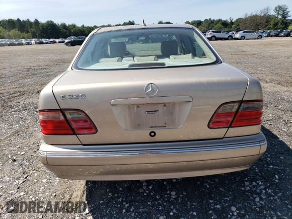 2000 Mercedes-Benz E-Class with VIN WDBJF65J2YB165568, listed as a Copart auction lot 70003994 with 146,518 mi miles and Salvage Title. Bid and sale history available at carsss.com. Image 6.