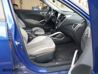 2012 Hyundai Veloster w/Black Int with VIN KMHTC6AD5CU027793, listed as a IAAI auction lot 41881333 with 134,984 mi miles. Bid and sale history available at carsss.com. Image 5.