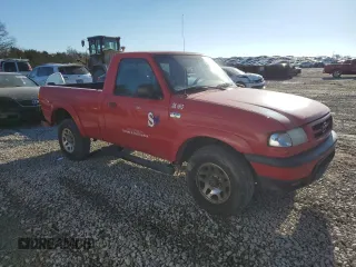 2001 Mazda B-Series 2WD Truck DS with VIN 4F4YR12U81TM29974, listed as a Copart auction lot 85988734 with 215,008 mi miles and Salvage Title. Bid and sale history available at carsss.com. Image 4.