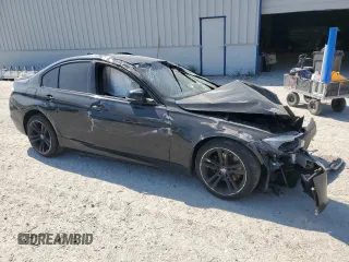 2013 BMW 3 Series 328i xDrive with VIN WBA3B5G51DNS01059, listed as a Copart auction lot 53052185 with Not provided miles and Clean title. Bid and sale history available at DreamBid. Image 4.