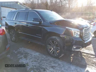 2019 GMC Yukon Denali with VIN 1GKS2CKJ2KR137664, listed as a IAAI auction lot 41335229 with 151,394 mi miles. Bid and sale history available at carsss.com. Image 1.