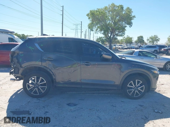 2018 Mazda CX-5 Grand Touring with VIN JM3KFBDM8J0314925, listed as a IAAI auction lot 41825917 with 70,027 mi miles. Bid and sale history available at carsss.com. Image 14.