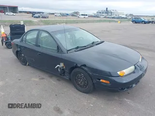2002 Saturn SL z VIN 1G8ZH52812Z260075, wystawiony jako IAAI lot #42173876 z przebiegiem 82 954 mil mil oraz . Historia ofert i sprzedaży dostępna na DreamBid. Obrazek 1.