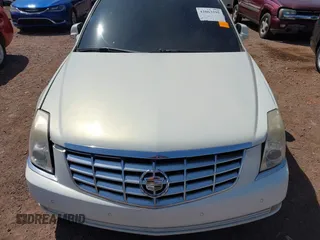 2006 Cadillac DTS w/1SC with VIN 1G6KD57Y36U116528, listed as a IAAI auction lot 42063595 with 128,839 mi miles. Bid and sale history available at carsss.com. Image 6.