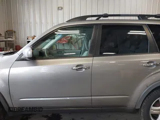 2009 Subaru Forester X with VIN JF2SH63619H731296, listed as a IAAI auction lot 42294036 with 184,739 mi miles and . Bid and sale history available at DreamBid. Image 14.