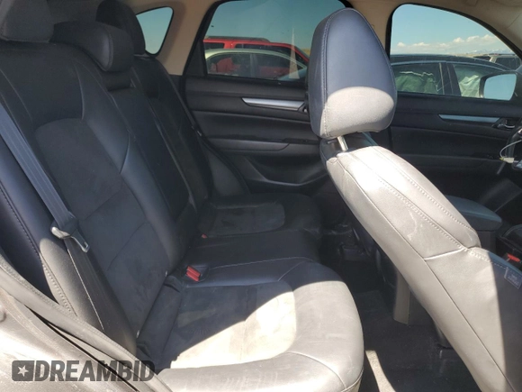 2018 Mazda CX-5 Touring z VIN JM3KFACM5J0338126, wystawiony jako Copart lot #56185795 z przebiegiem 115 254 mil mil oraz Szkoda całkowita • Salvage title. Historia ofert i sprzedaży dostępna na DreamBid. Obrazek 11.