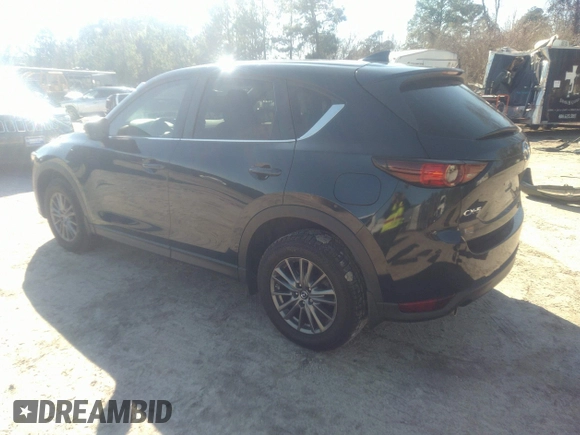 2020 Mazda CX-5 Touring with VIN JM3KFACM1L1817303, listed as a IAAI auction lot 41627859 with 57,268 mi miles. Bid and sale history available at carsss.com. Image 3.