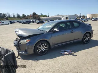 2014 Scion tC with VIN JTKJF5C7XE3085579, listed as a Copart auction lot 52431165 with 44,421 mi miles and Salvage Title. Bid and sale history available at carsss.com. Image 1.