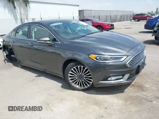 2017 Ford Fusion SE with VIN 3FA6P0H91HR390617, listed as a IAAI auction lot 42553645 with 77,034 mi miles and . Bid and sale history available at DreamBid. Image 1.