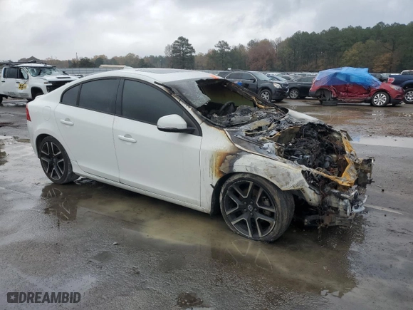 2017 Volvo S60 Dynamic with VIN YV126MFL7H2436435, listed as a Copart auction lot 84264204 with 0 mi miles and Salvage Title. Bid and sale history available at carsss.com. Image 4.