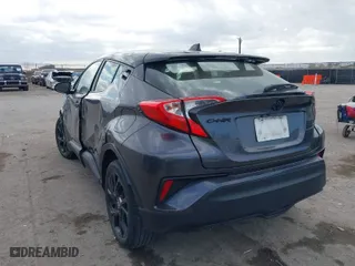 2021 Toyota C-HR LE with VIN JTNKHMBX9M1118773, listed as a IAAI auction lot 41115157 with 57,289 mi miles. Bid and sale history available at carsss.com. Image 3.
