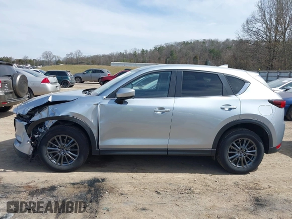 2020 Mazda CX-5 Touring with VIN JM3KFBCM3L0791816, listed as a IAAI auction lot 41761623 with 87,742 mi miles and . Bid and sale history available at carsss.com. Image 14.