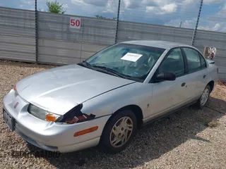 2002 Saturn SL with VIN 1G8ZF52842Z147985, listed as a IAAI auction lot 42601452 with 50,301 mi miles and . Bid and sale history available at DreamBid. Image 2.