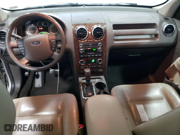 2009 Ford Taurus X Limited with VIN 1FMDK03W59GA01446, listed as a Copart auction lot 80666874 with 135,957 mi miles and Salvage title. Bid and sale history available at DreamBid. Image 8.
