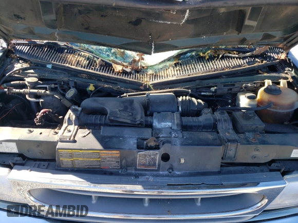 1999 Ford Econoline Passenger XL with VIN 1FBSS31L0XHB12679, listed as a Copart auction lot 74257504 with 136,821 mi miles and Salvage Title. Bid and sale history available at DreamBid. Image 12.