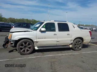 2004 Cadillac Escalade EXT z VIN 3GYEK62N34G304883, wystawiony jako IAAI lot #42149493 z przebiegiem 177 911 mil mil oraz . Historia ofert i sprzedaży dostępna na DreamBid. Obrazek 14.