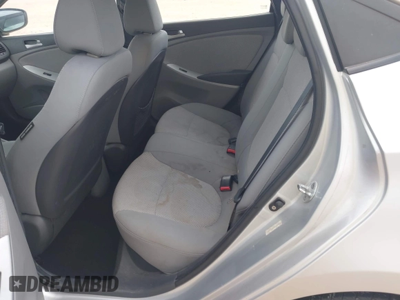 2012 Hyundai Accent GLS z VIN KMHCT4AE8CU095891, wystawiony jako IAAI lot #42256404 z przebiegiem 171 514 mil mil oraz . Historia ofert i sprzedaży dostępna na DreamBid. Obrazek 8.