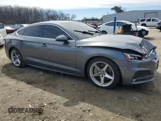 2018 Audi A5 Sportback Premium Plus with VIN WAUENCF54JA061579, listed as a Copart auction lot 49899095 with 90,295 mi miles and Salvage Title. Bid and sale history available at DreamBid. Image 4.
