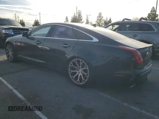 2015 Jaguar XJ with VIN SAJWA3HT2FMV89272, listed as a Copart auction lot 42195005 with 131,456 mi miles and Clean Title. Bid and sale history available at DreamBid. Image 2.