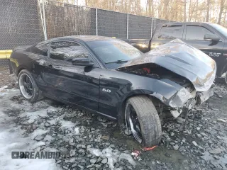 2012 Ford Mustang GT Premium with VIN 1ZVBP8CF1C5263105, listed as a Copart auction lot 43135345 with 146,670 mi miles and Salvage Title. Bid and sale history available at DreamBid. Image 4.