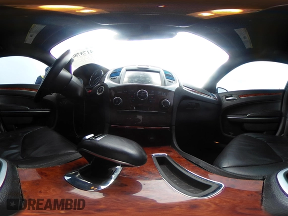 2014 Chrysler 300 with VIN 2C3CCAAG2EH235495, listed as a IAAI auction lot 41787801 with 142,354 mi miles and . Bid and sale history available at DreamBid. Image 18.