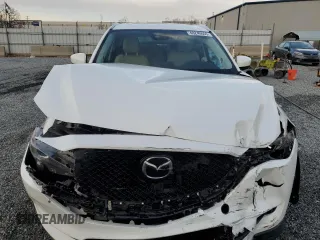 2020 Mazda CX-5 Touring with VIN JM3KFACM0L0863937, listed as a Copart auction lot 48240655 with 70,592 mi miles and Salvage Title. Bid and sale history available at carsss.com. Image 5.