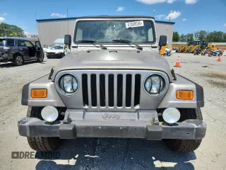 2001 Jeep Wrangler Sport with VIN 1J4FA49S21P374356, listed as a Copart auction lot 63568695 with 202,853 mi miles and Clean title. Bid and sale history available at DreamBid. Image 5.