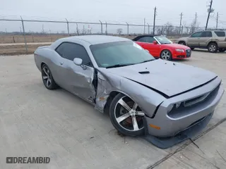 2014 Dodge Challenger SXT with VIN 2C3CDYAG1EH260619, listed as a IAAI auction lot 41430390 with 161,163 mi miles. Bid and sale history available at carsss.com. Image 1.