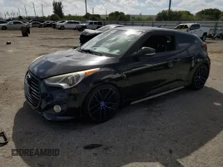 2016 Hyundai Veloster Turbo with VIN KMHTC6AE7GU279107, listed as a Copart auction lot 77386233 with 105,872 mi miles. Bid and sale history available at carsss.com. Image 1.